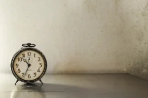 Vintage clock in a sunset lighting